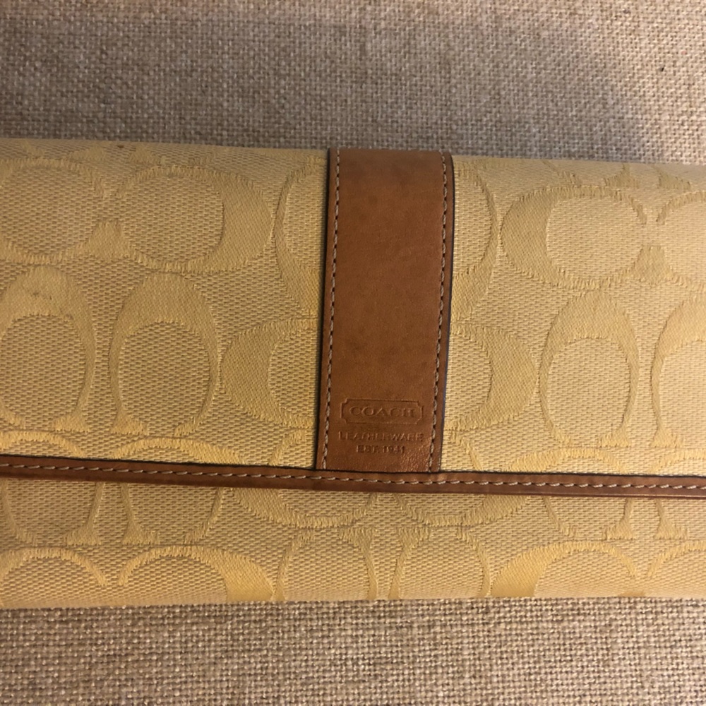 Beautiful yellow Coach trifold wallet